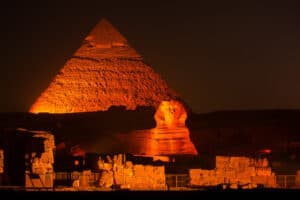 egyptian wonders monuments at night in skyline view - egypt