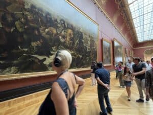 art lovers at the Louvre