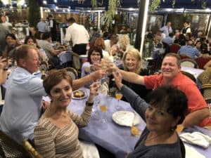 Travel group eating dinner in Barcelona
