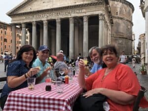 Sandra in front of the Pantheon with other travelers