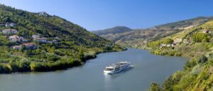 A Viking river ship sailing along the Douro River