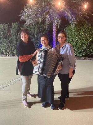 The two gurus and Jiji with her acordian