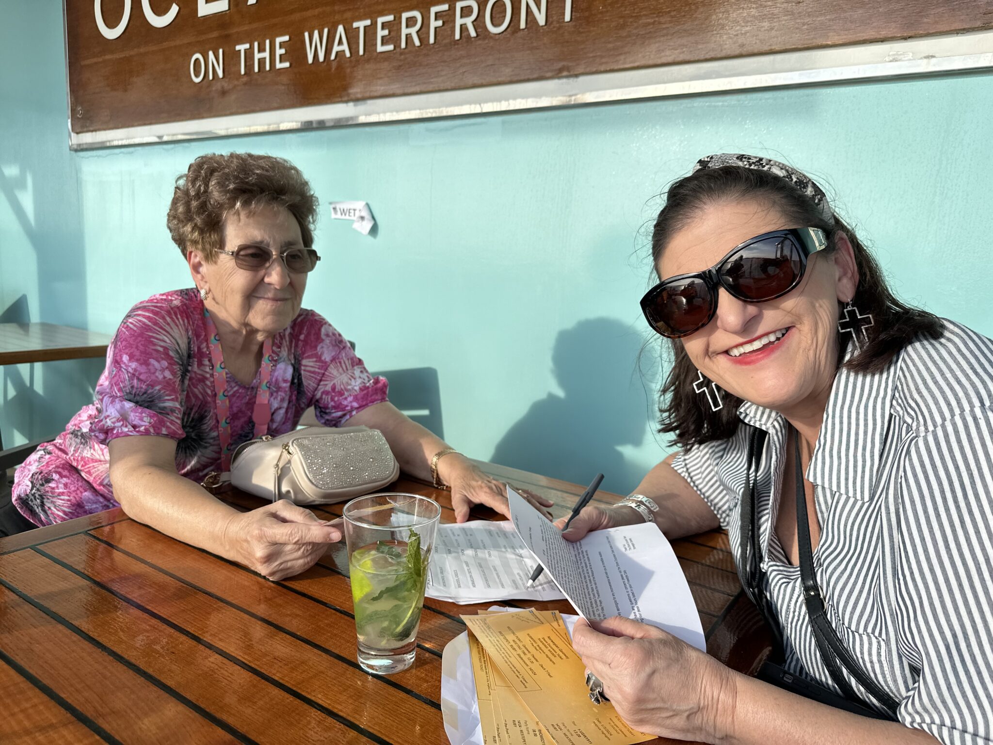 Nancy with Two Travel Gurus supporting our Traveler