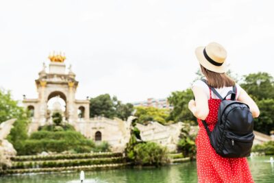 Young adult female tourist visiting Parc de la Ciutadella in Barcelona