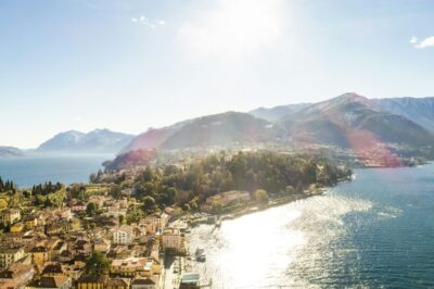 Aerial view of Bellagio village on Como lake with blue sky and the Alps in the Bellagio, Como, Italy