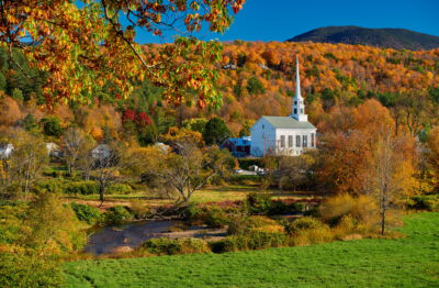 Iconic New England church in Stowe town at autumn